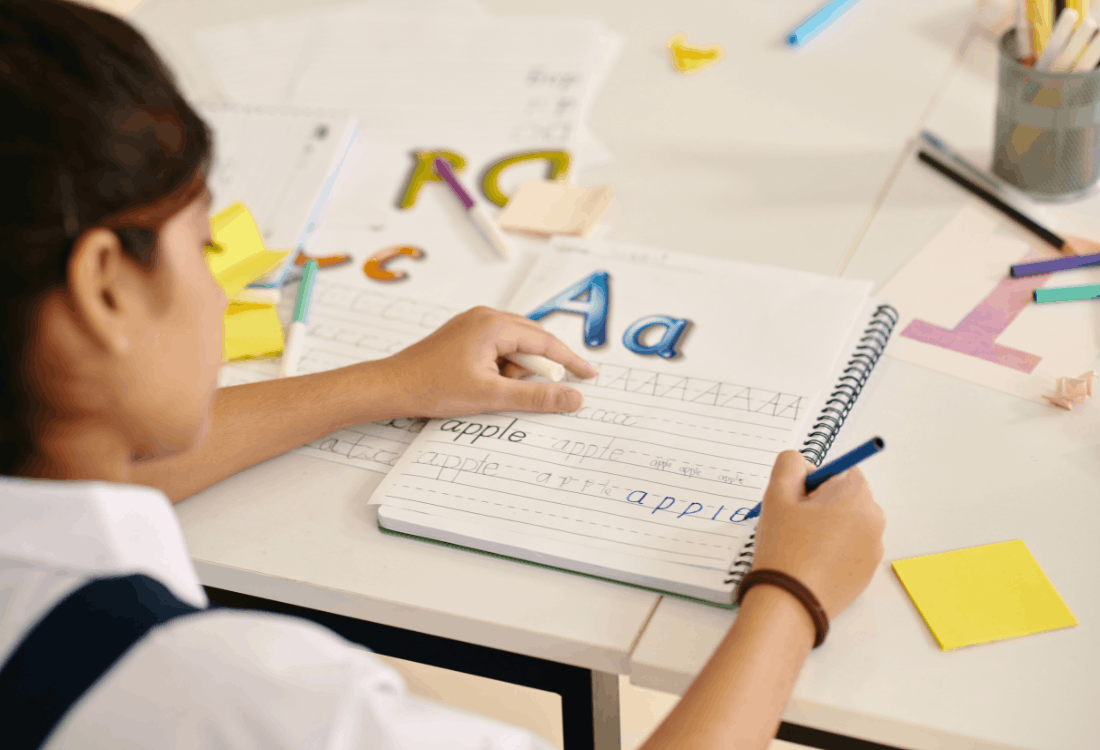 A student in their classroom unable to concentrate due to the effects of their dirty classroom having a negative impact on their focus and learning.